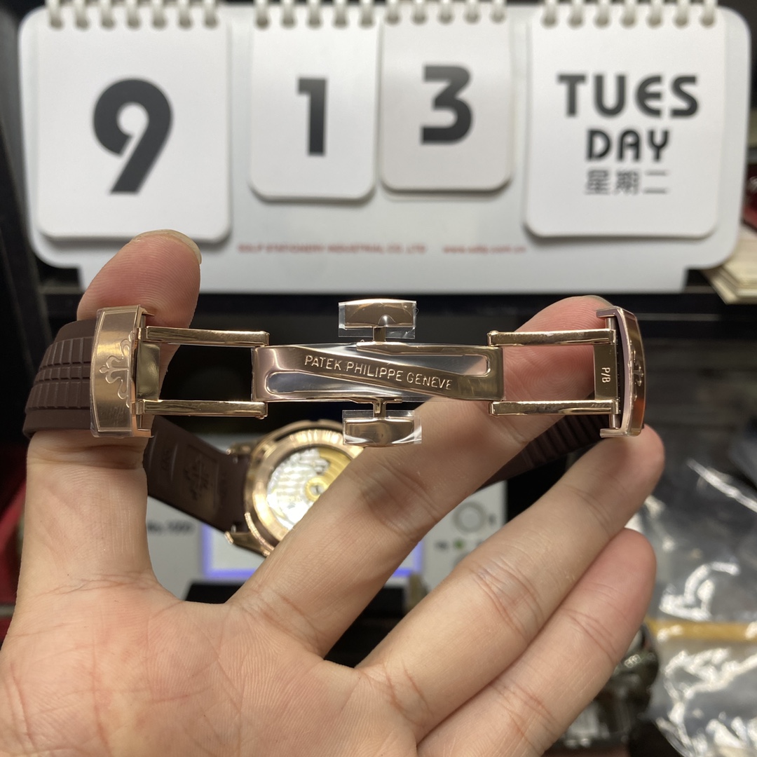 Patek Philippe Aquanaut Travel Time series 5164R-001, brown dial, GMT Dual Time Function, 40.8mm size.