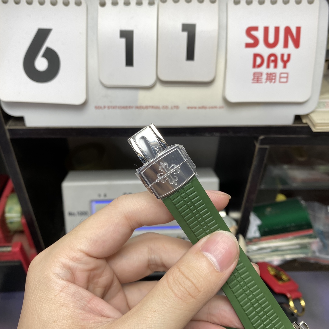 Patek Philippe Aquanaut Series 5168G-010, Green Dial Green Rubber Strap, 42.2mm Size.