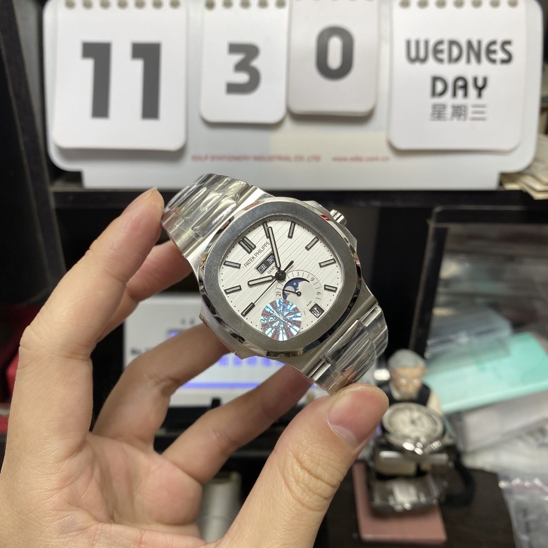 Patek Philippe Nautilus series 57261A-010, White Dial, Complete Month Day Date and Moon Phase Functions, 40.5mm Size.