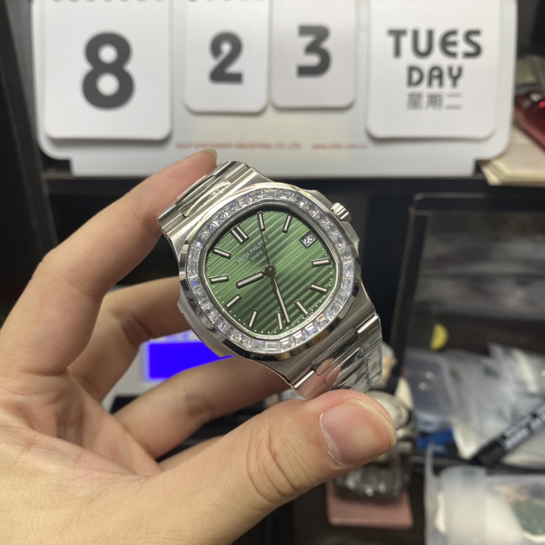 Patek Philippe Nautilus series 57111300A-001, Olive Green Dial with Square Diamond Bezel, 40mm Size.
