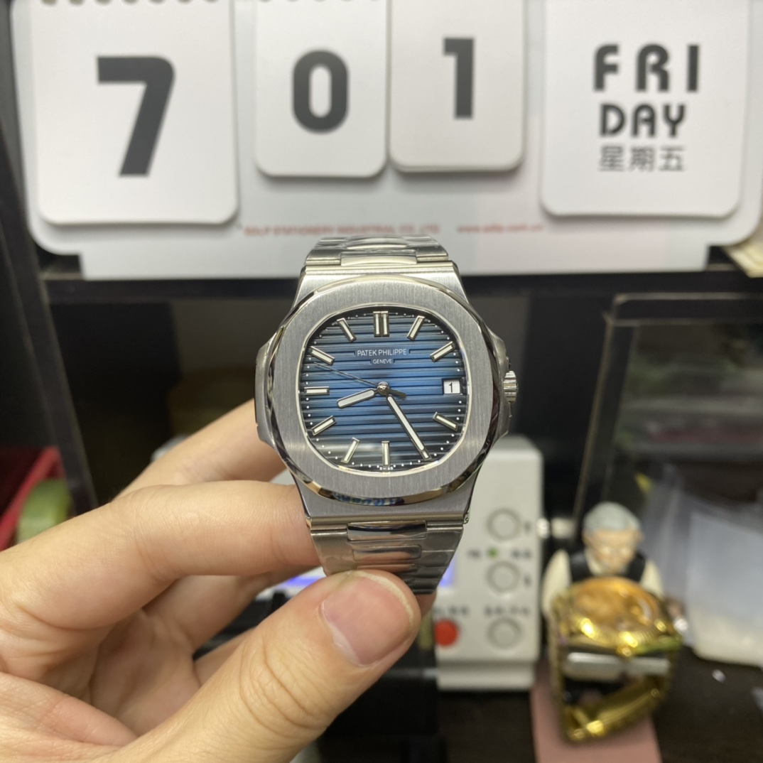 Patek Philippe Nautilus series 58111G-001, White Case with Blue Dial, 40mm Size.