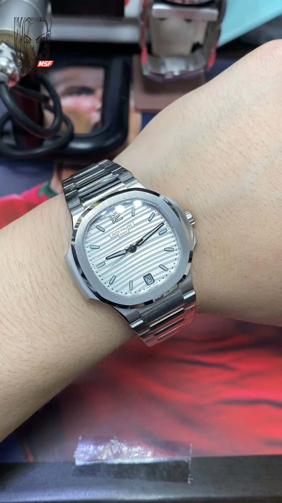 Patek Philippe Nautilus series 71181A-010, White Dial with Steel Bracelet Version, 35.2mm size.