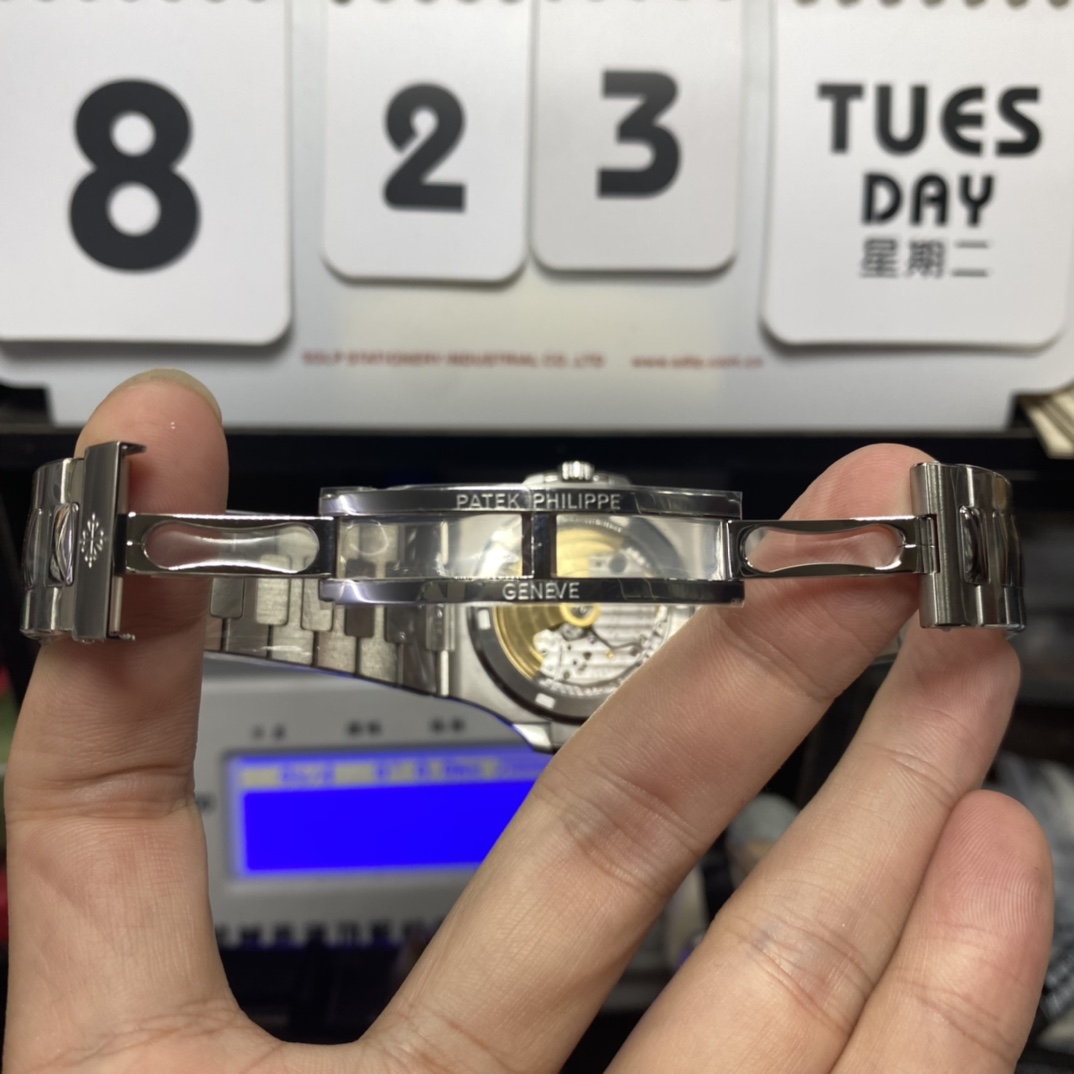 Patek Philippe Nautilus series 57111300A-001, Olive Green Dial with Square Diamond Bezel, 40mm Size.