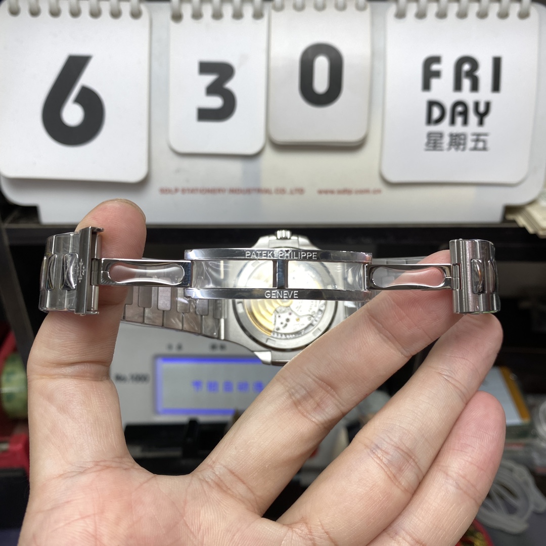 Patek Philippe Nautilus series 57111300A-001, Olive Green Dial with Square Diamond Bezel, 40mm Size.