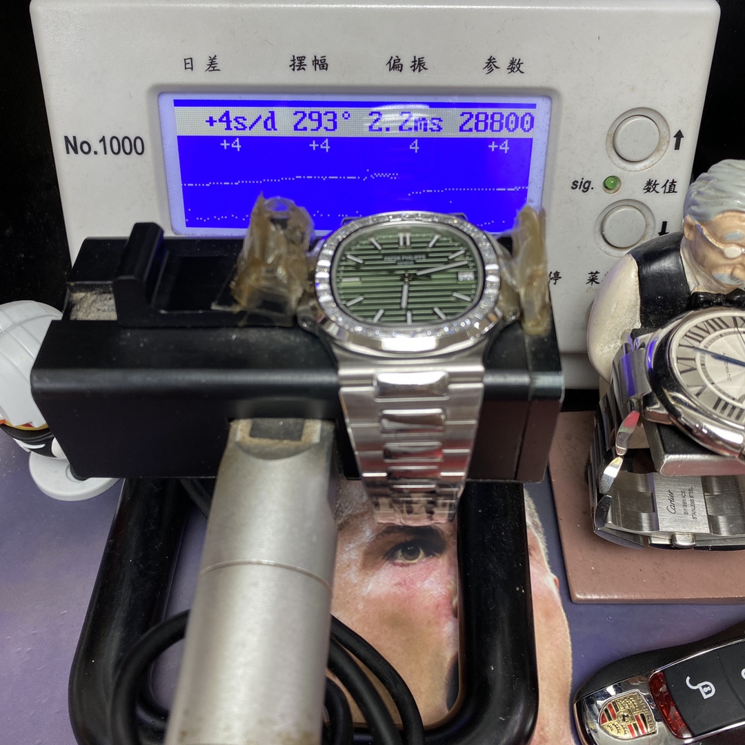 Patek Philippe Nautilus series 57111300A-001, Olive Green Dial with Square Diamond Bezel, 40mm Size.