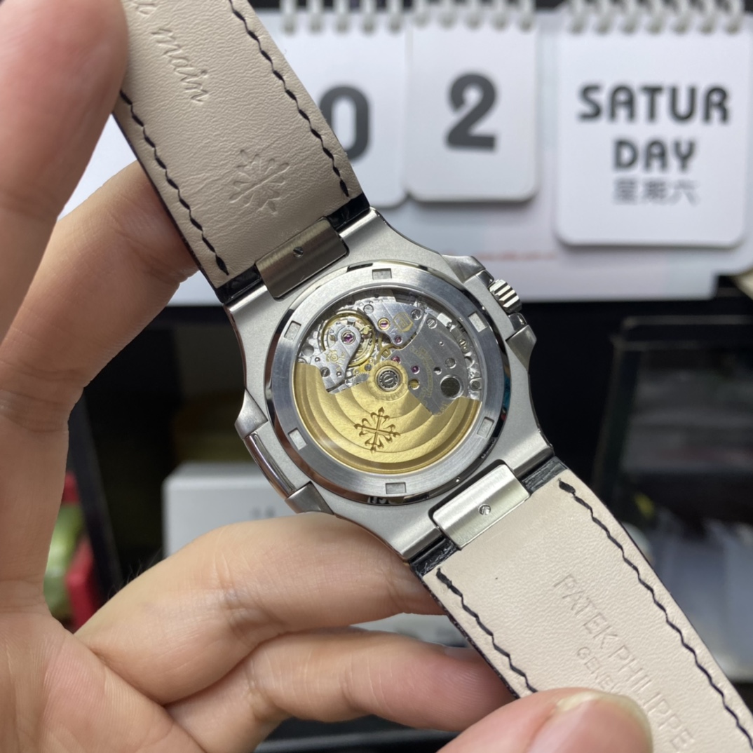 Patek Philippe Nautilus series 57111A 010, Blue Dial Silver Case and Alligator Leather Strap, 40mm Size.