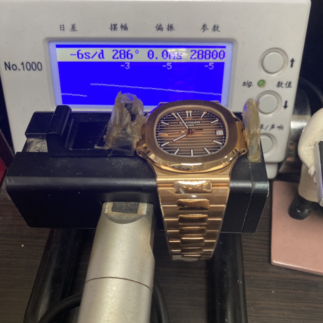 Patek Philippe Nautilus series 57111R-001, Rose Gold Case with Gradient Dark Brown Dial Steel Bracelet, 40mm Size.