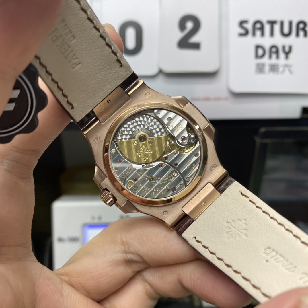 Patek Philippe Nautilus series 5712GR-001, Coffee Dial Rose Gold Case Brown Leather Strap, 40mm size.