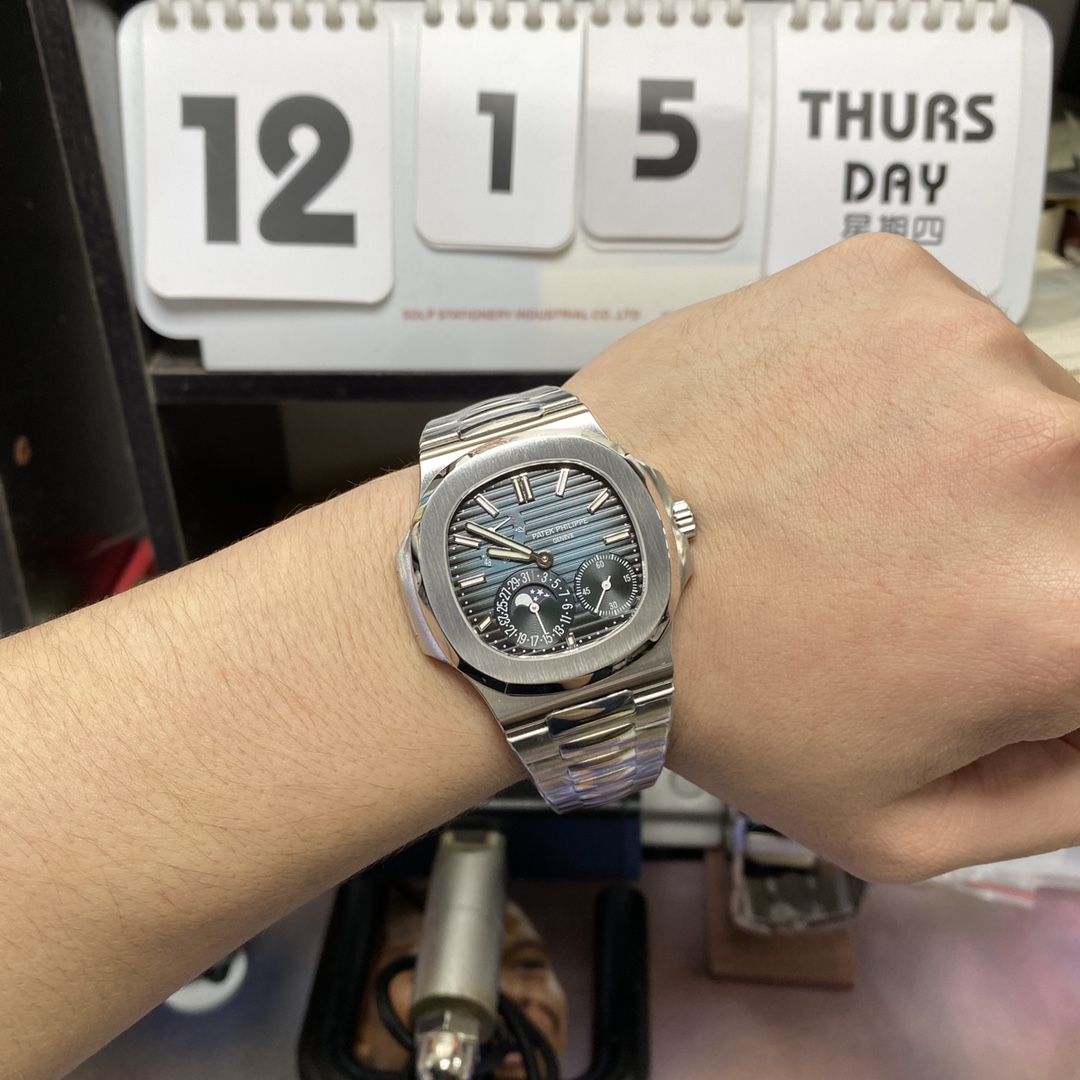 Patek Philippe Nautilus series 57121A-001, Blue Dial Steel Bracelet, Synchronized Functions, 40mm size.