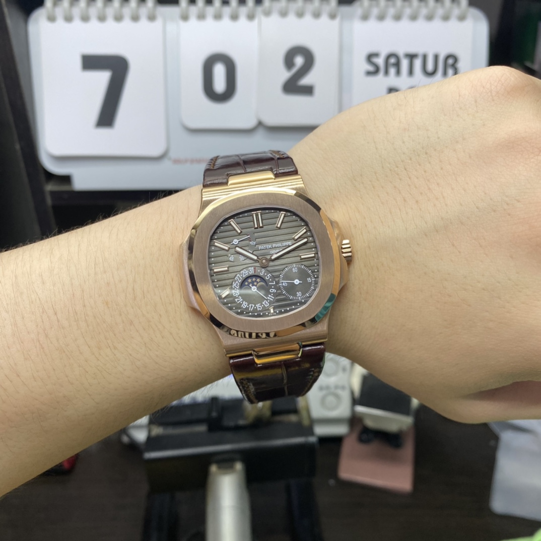 Patek Philippe Nautilus series 5712GR-001, Coffee Dial Rose Gold Case Brown Leather Strap, 40mm size.