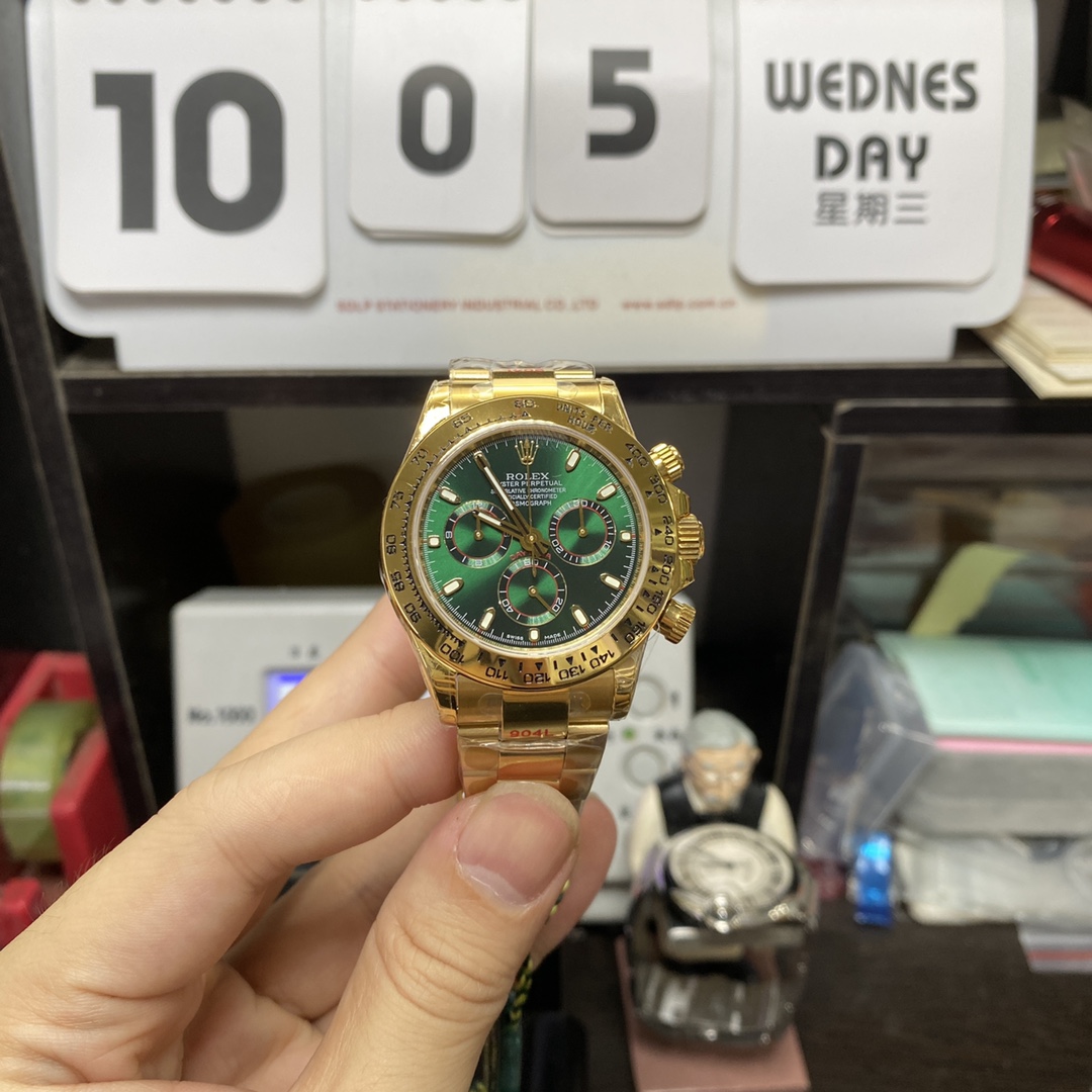 Rolex Cosmograph Daytona series m116508-0013, gold case green dial, 40mm size.