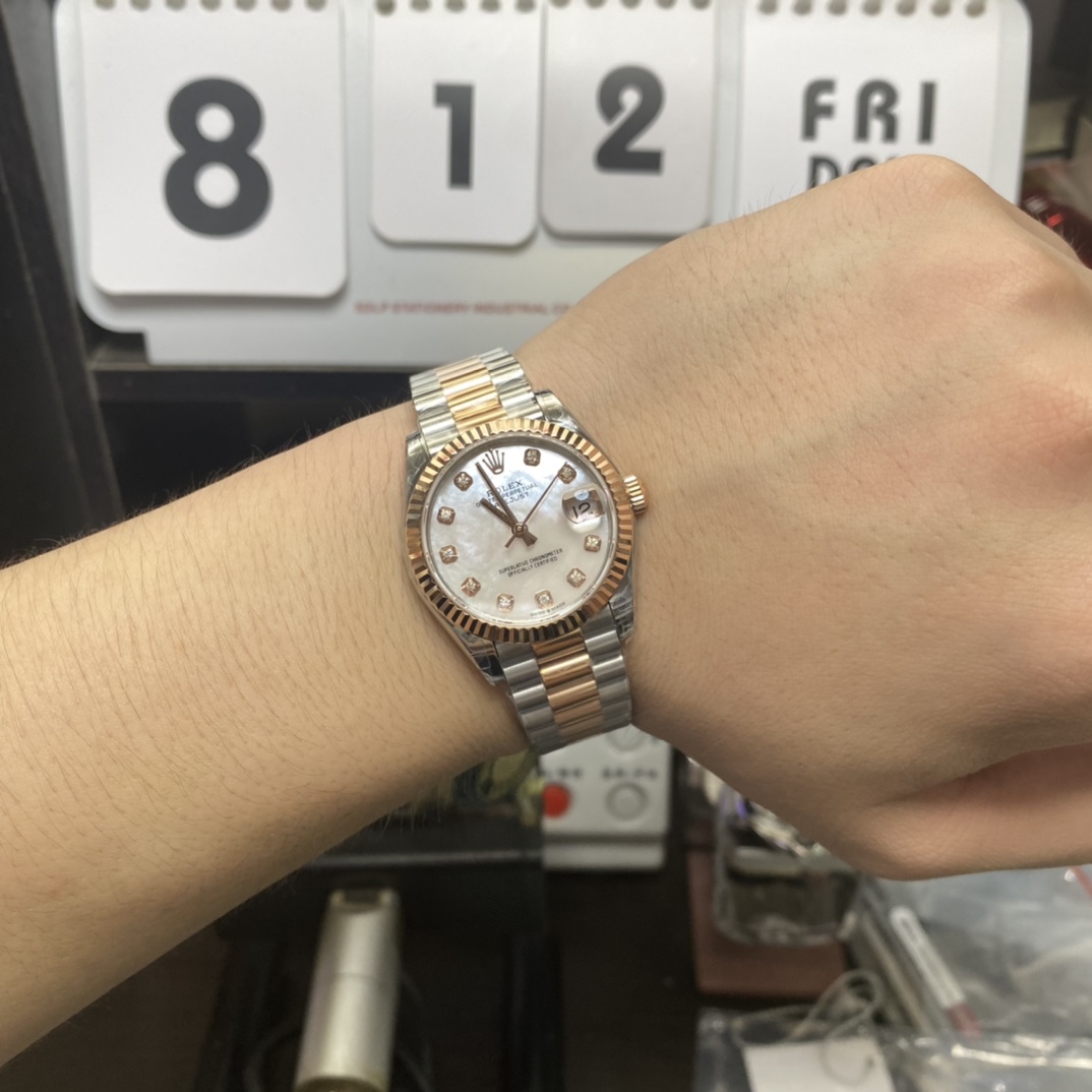 Rolex Series m278273-0027, Mother-of-Pearl Dial with Gold Fluted Bezel Five-Piece Pearl Bracelet, 31mm Size.