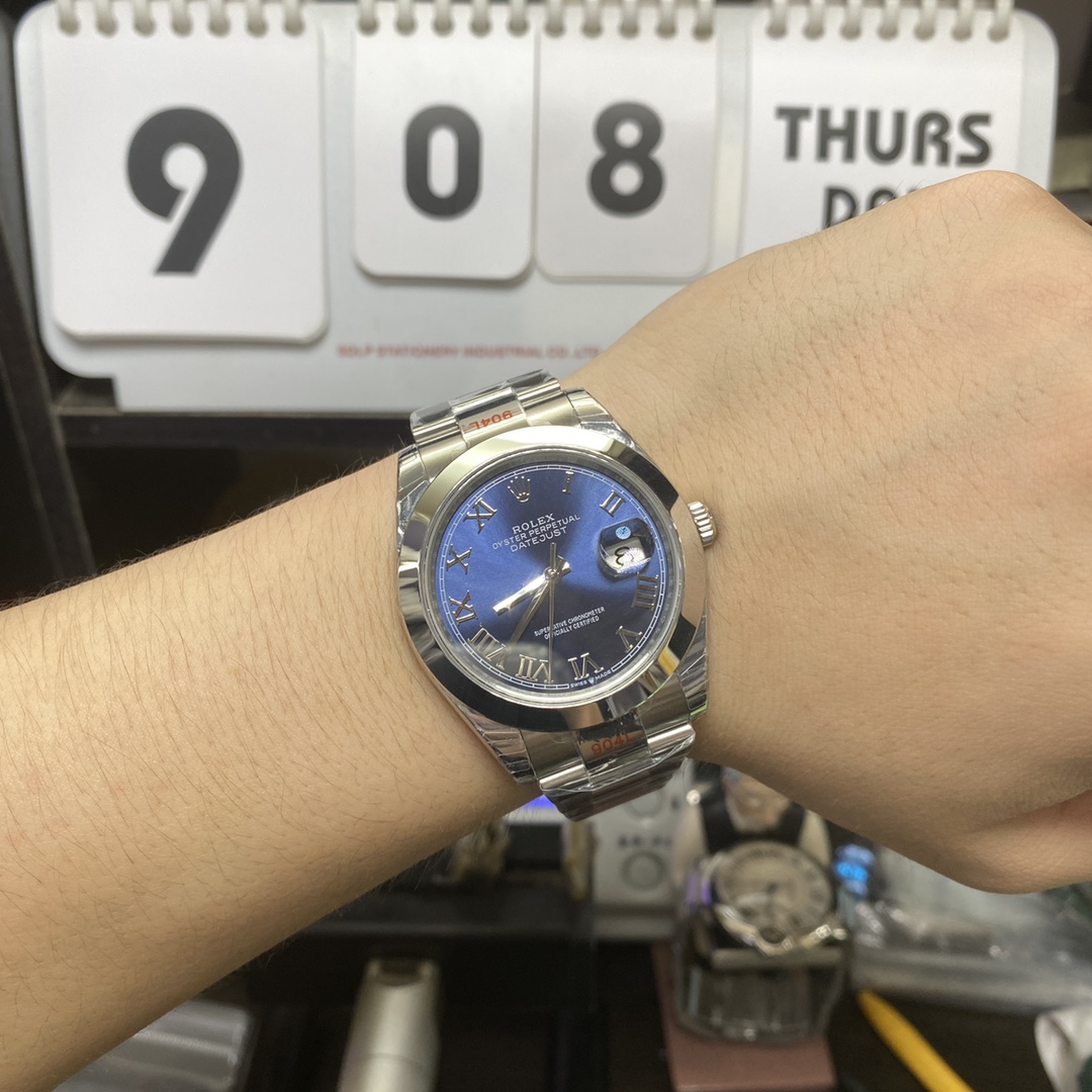 Rolex Datejust series m126300-0017, blue dial featuring Roman numeral markers, 41mm size.