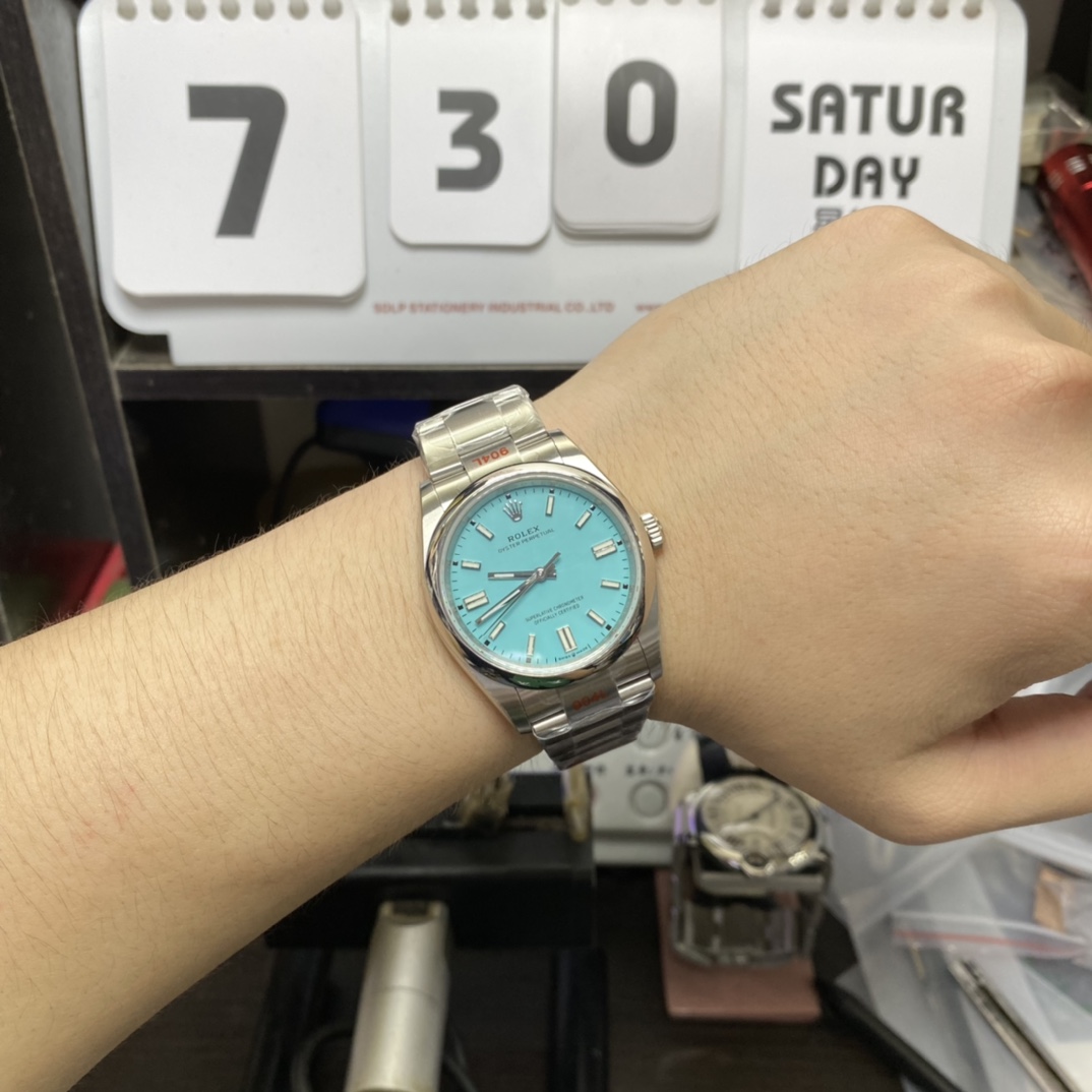 Rolex Oyster Perpetual Series m126000-0006, Tiffany Blue Dial, 36mm size.