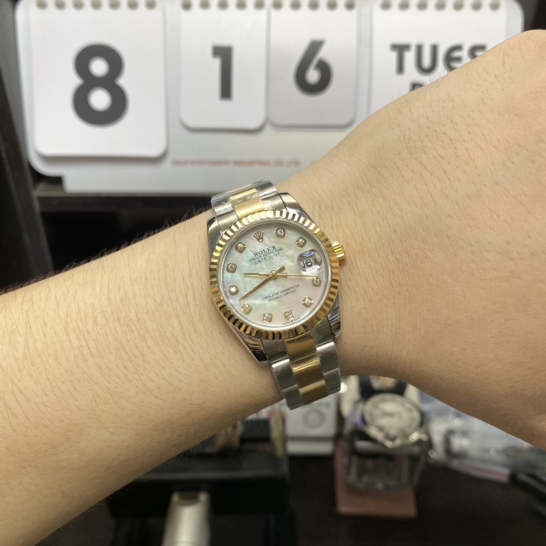Rolex Datejust Series m278273-0027, Mother-of-Pearl Dial with Diamond Hour Markers Fluted Bezel, 31mm size, Oyster stainless steel bracelet.