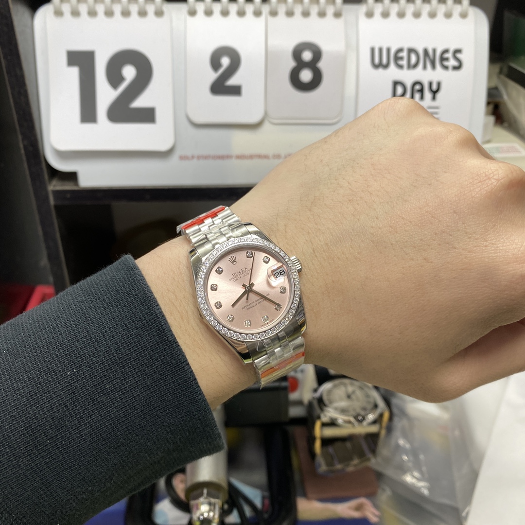 Rolex Datejust series m278384rbr-0036, Pink Dial with Diamond Bezel, 31mm size, Jubilee stainless steel bracelet.