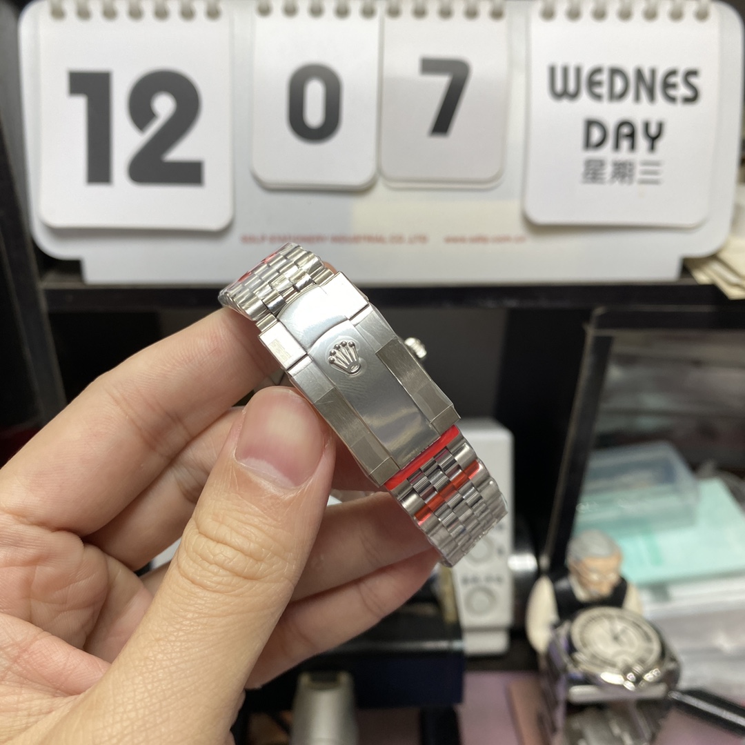 Rolex Datejust Series m126334-0024, White Dial with Roman Numerals and a five-link steel bracelet, 41mm size.