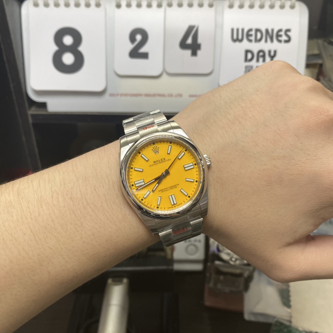 Rolex Oyster Perpetual Series m124300-0004, Yellow Dial, 41mm size.