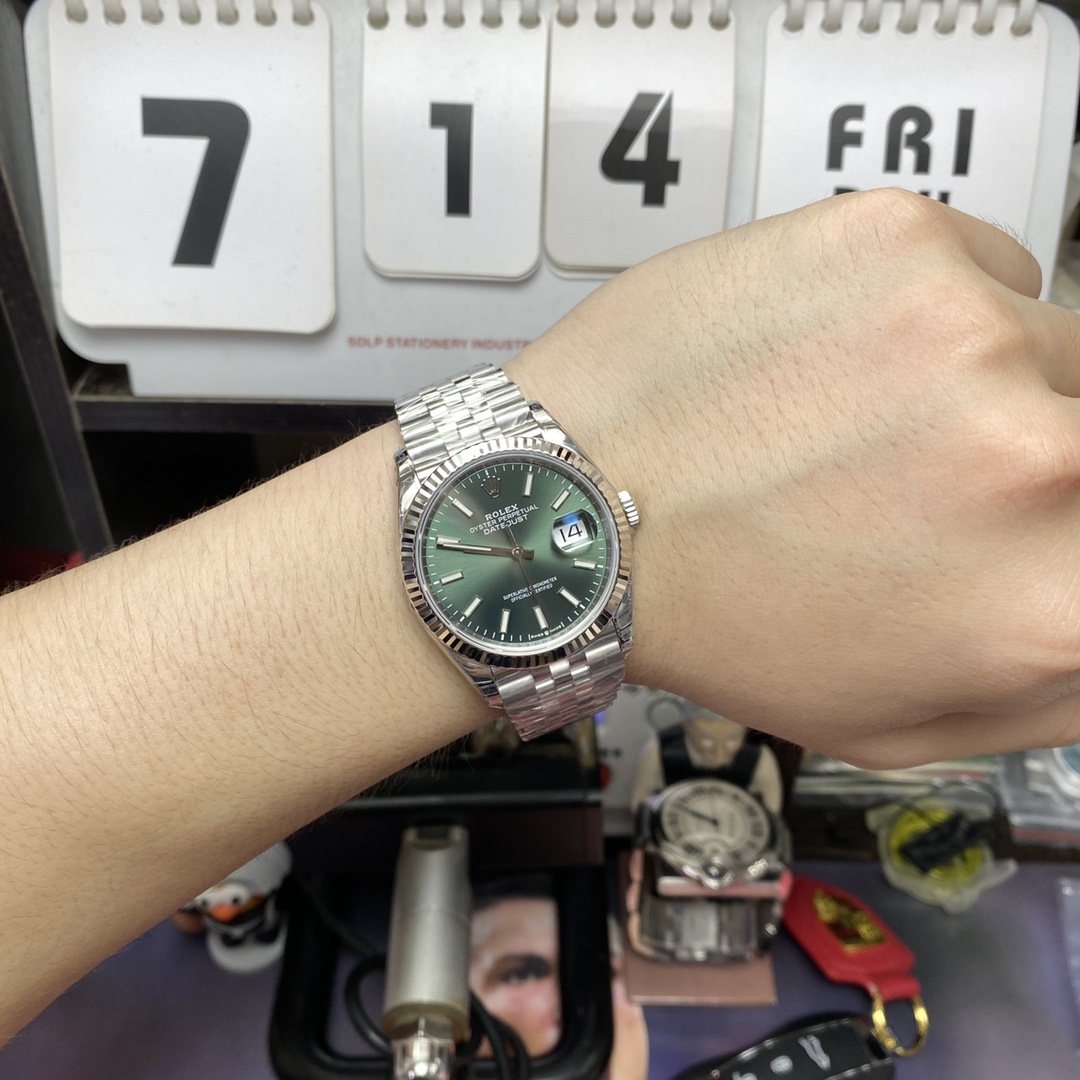 Rolex Datejust series m126234-0051, Mint Green Dial with Fluted Bezel, 36mm size.