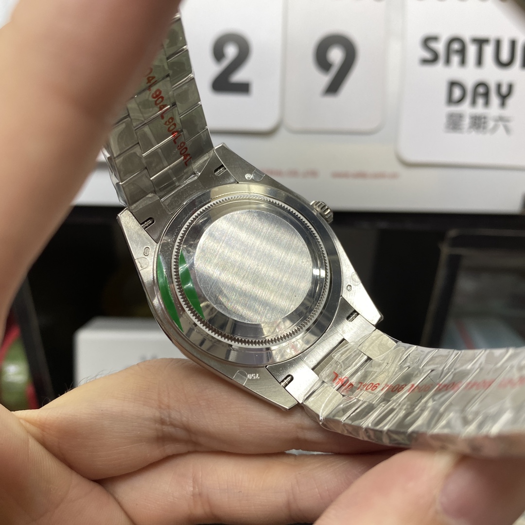 Rolex Day-Date series m228239-0033, Silver Case Olive Green Dial with Roman Numeral Markers, Instantaneous Day and Date Functions, 40mm Size.