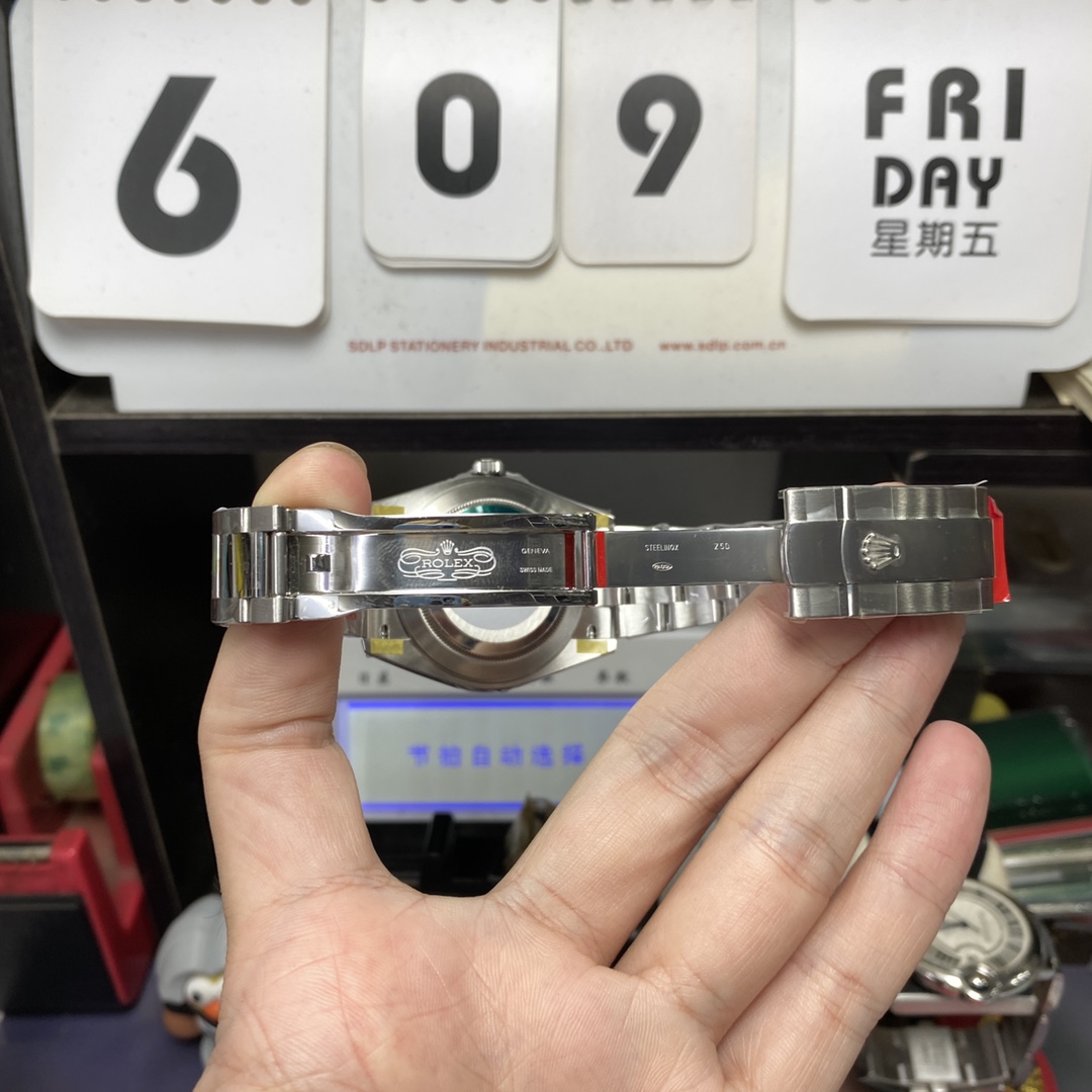 Rolex Datejust series m126334-0021, Grey Dial Green Roman Numerals, 41mm size. Oyster strap