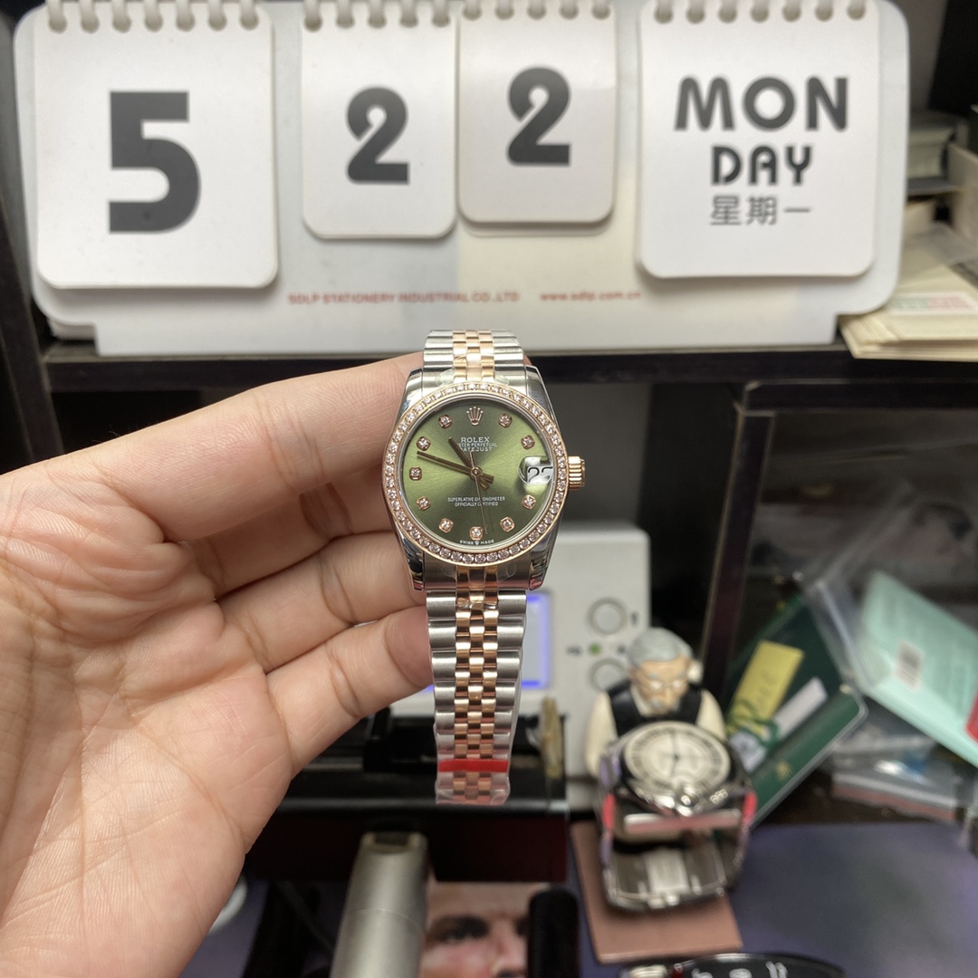 Rolex Datejust series m278383rbr-0030, Two-Tone Gold Case with Green Dial and Diamond Bezel, 31mm size, Jubilee bracelet.