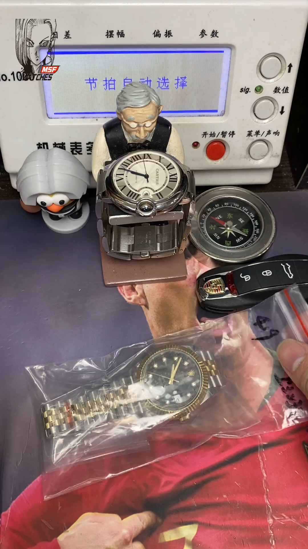 Rolex Datejust series m126333-0006, two-tone gold case black dial with diamond markers and a five-link two-tone gold bracelet, 41mm size.