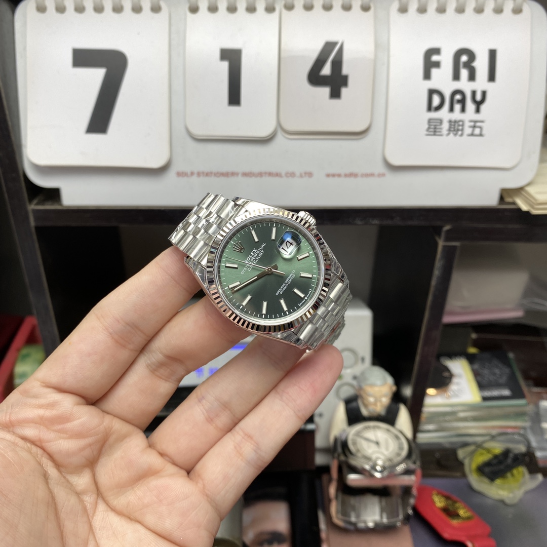 Rolex Datejust series m126234-0051, Mint Green Dial with Fluted Bezel, 36mm size.