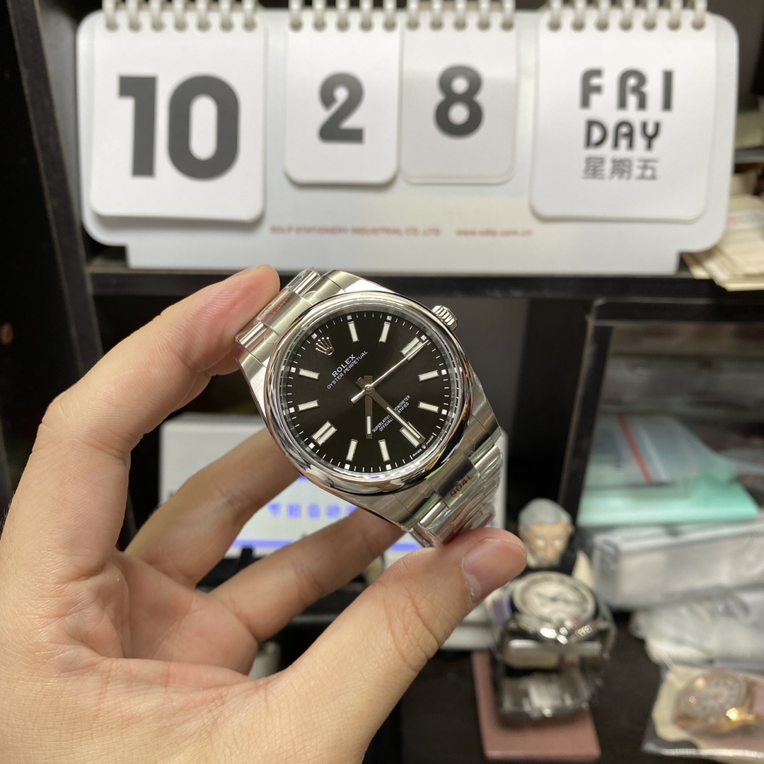 Rolex Oyster Perpetual series m124300-0002, Black Dial with Stick Indexes, 41mm size.